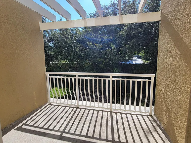 Master bedroom suite with a balcony to Turkey Lake Rd.