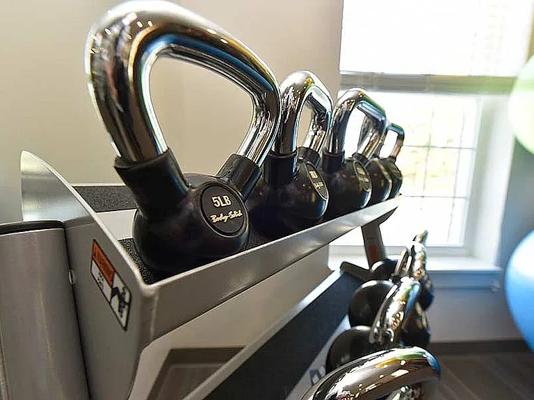 Details matter_like a full range of kettlebells for strength training, right inside 32 Union's fully equipped fitness center.