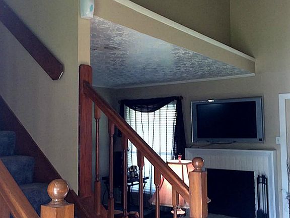 Home features gas fireplace, perfect for those chilly winter nights.