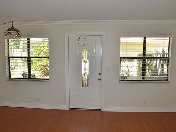 Living room area looking toward front door