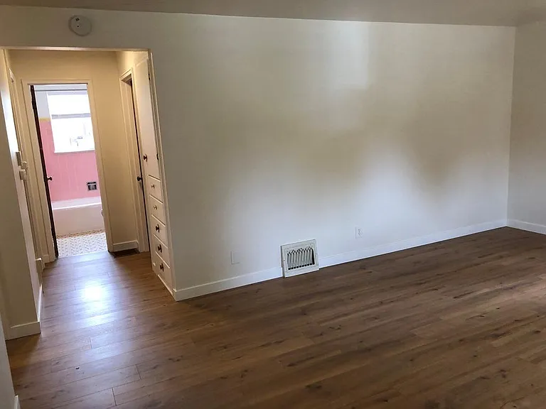 Hallway to bath and bedrooms