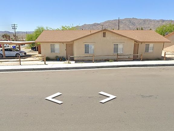 Street view entry is left door. Property is a duplex