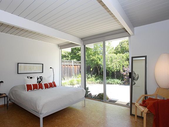 Large Master Bedroom leading out to private yard