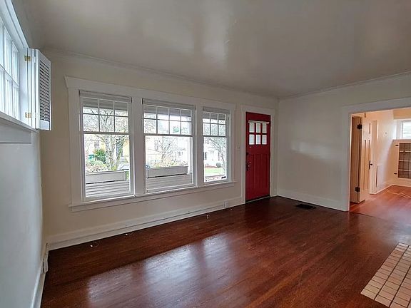 Living room with view of front porch