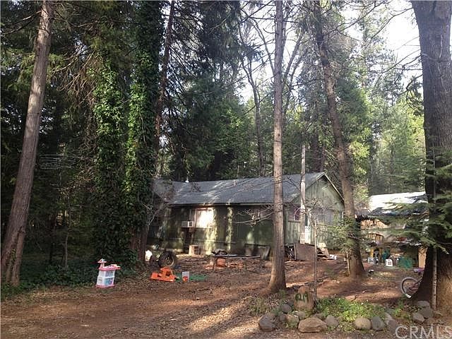main house has newer roof. property is 31 level acres with power and water