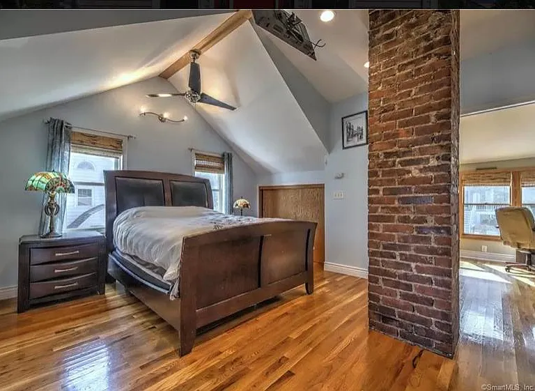 upstairs master. BR. a wall has been added- with door however can go either way.