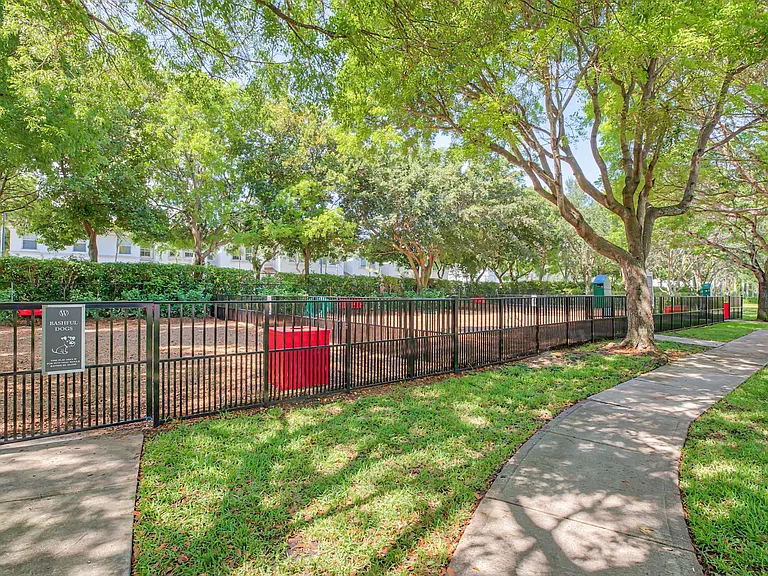 Large, fenced-in, leash-free bark park for your fluffy friends.