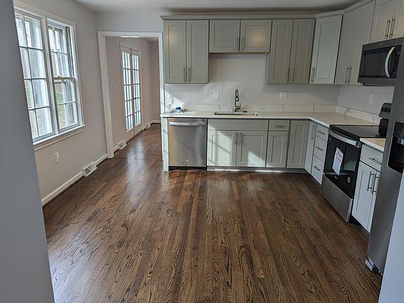 renovated kitchen with refinished HW floors, new cabinets & appliances