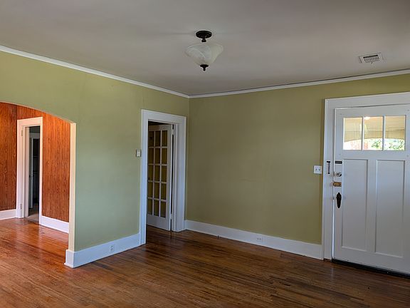 Living room with coat/storage closet