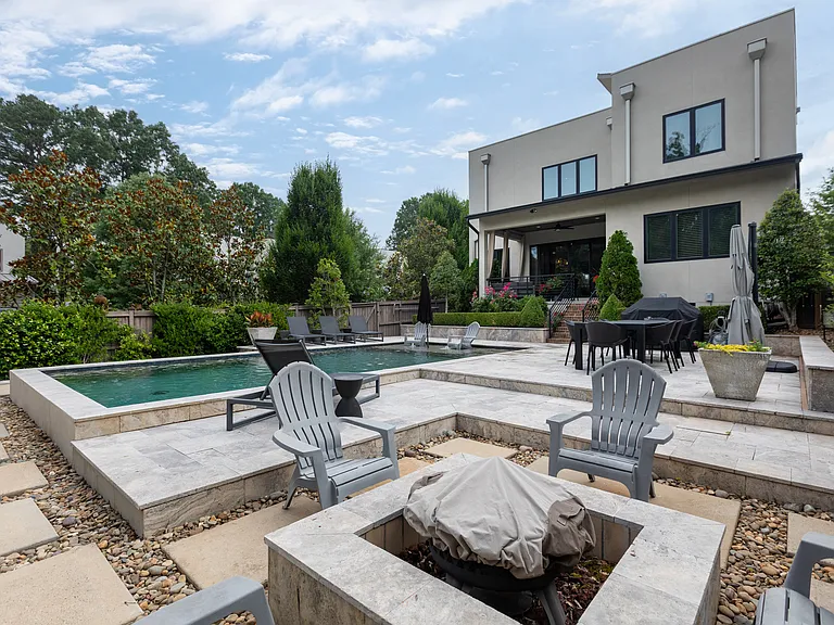 Fire pit near the pool great for roasting marshmallows or relaxing around a fire.