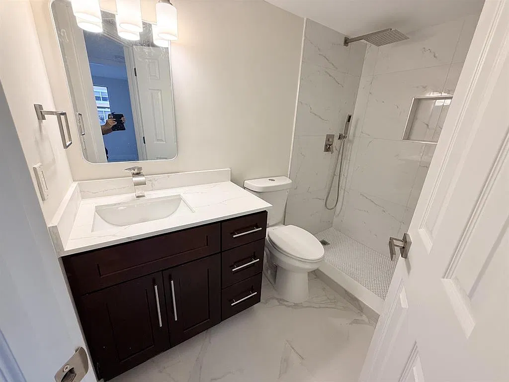 8801 Wiles Rd — Photo 4