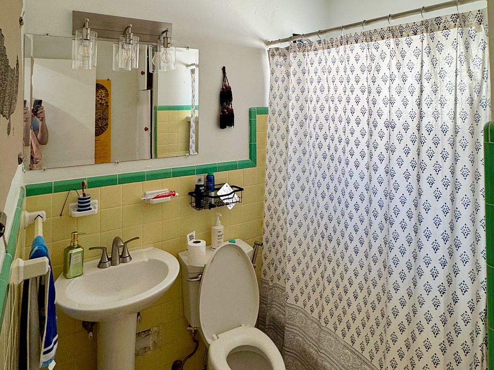 The apartment has two bathrooms. Both feature full size bathtubs.