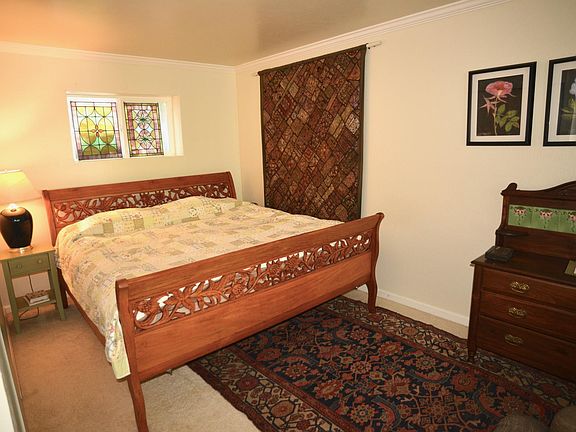 hand carved teak king size bed from Bali, Indonesia.