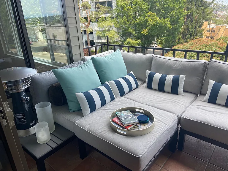 Balcony with stellar views!
Featuring Sunbrella deck furniture.