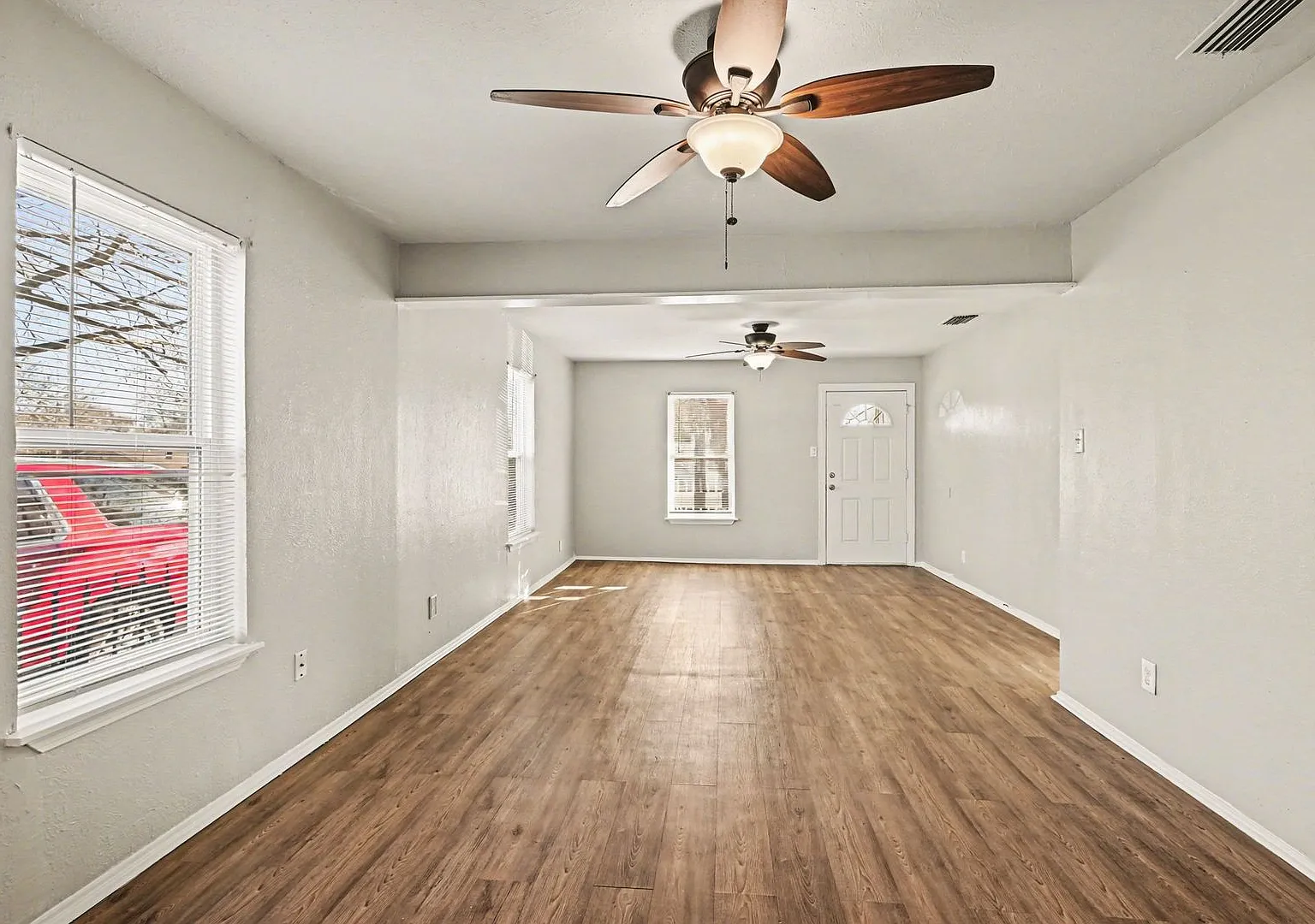 Functional Floorplan with Spacious Yard and Storage Shed — Photo 3