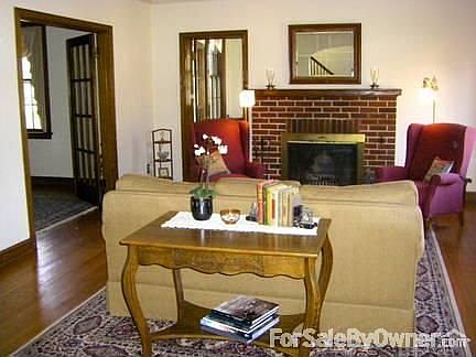 Living Room
						:
						Spacious, two large windows, fireplace & hardwood floor
original chestnut trim