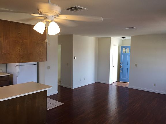 Entry area to Living Room with close , Hall Leads to Bedrooms and West Bathroom