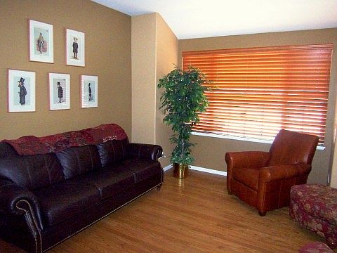 Formal Living Room w/Hardwood Floors & Wood Blinds...