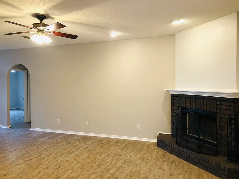Large, open Living Room. Beautiful floors. Clean property.