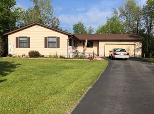5689 Riverside Beach Dr, Weidman, MI 48893