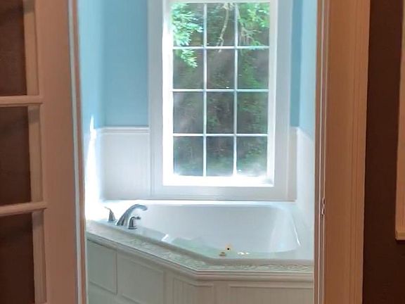 Large garden tub off of the master bedroom