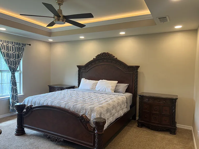 Owner Suite Bedroom with recess, lighting, as well as a coffered lighting in the Crawford ceiling