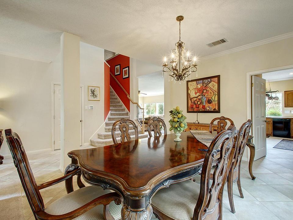 Formal Dining Leads to Butler's Pantry and Kitchen