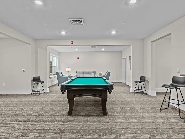 Active Adult clubhouse space with pool table