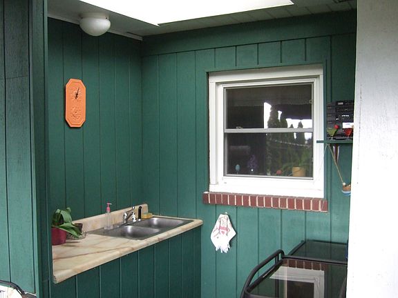 Outdoor wetbar with skylight.