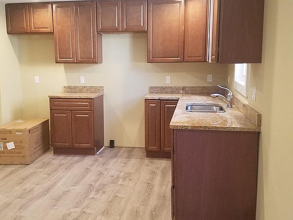 Kitchen before stove, refrigerator and microwave were installed