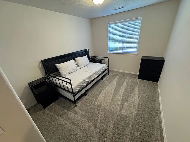 bedroom 3 is 9' x 11' with 2 door closet