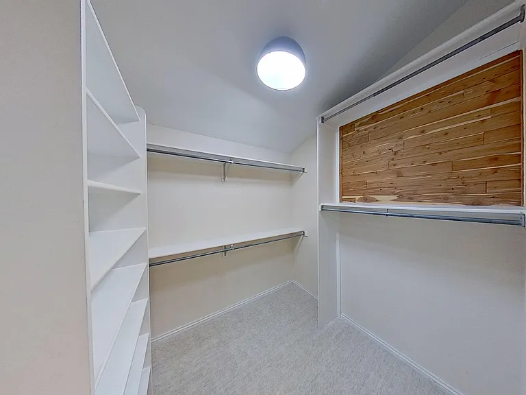 Master Walk-in closet with Cedar wall