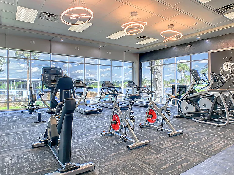 The tantalizing pool and river views seen from the resident fitness center infuse each workout with inspiration, creating an energetic haven for wellness seekers.
