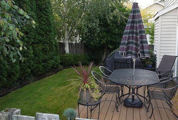 deck in fenced yard
