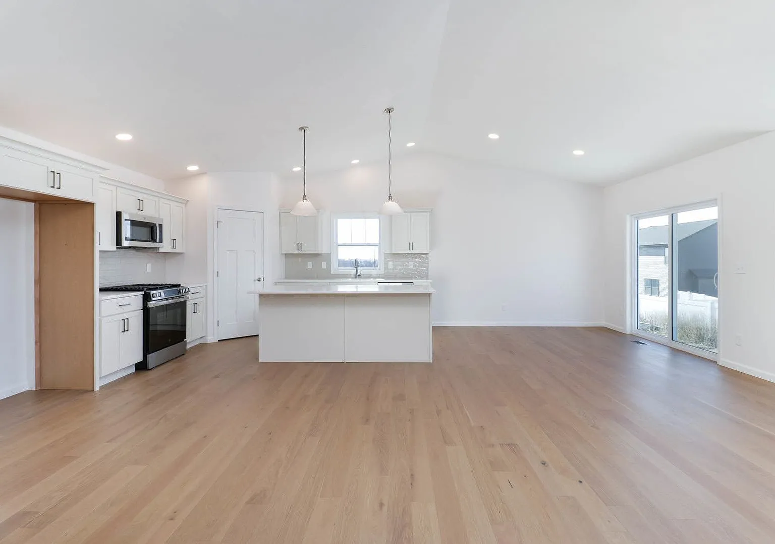 Brand-New Home with Gas Fireplace, Modern Finishes & 2-Car Garage — Photo 3
