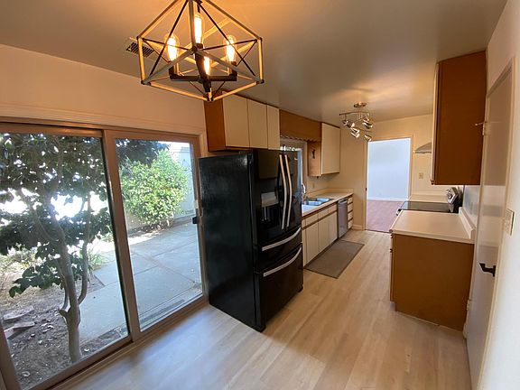 Newly renovated kitchen floor that comes with dishwasher and refrigerator