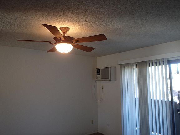 Ceiling fan and wall mounted AC/heater