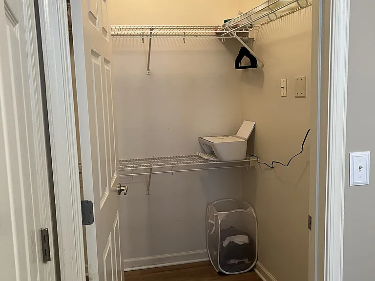 Master bed walk-in closet, one half of space is to left inside door.