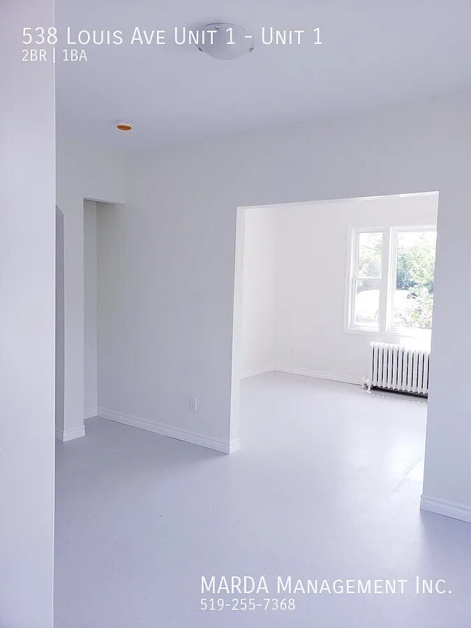 Charming 2 Bed/1 Bath Near Downtown + Hydro & Gas! — Photo 3