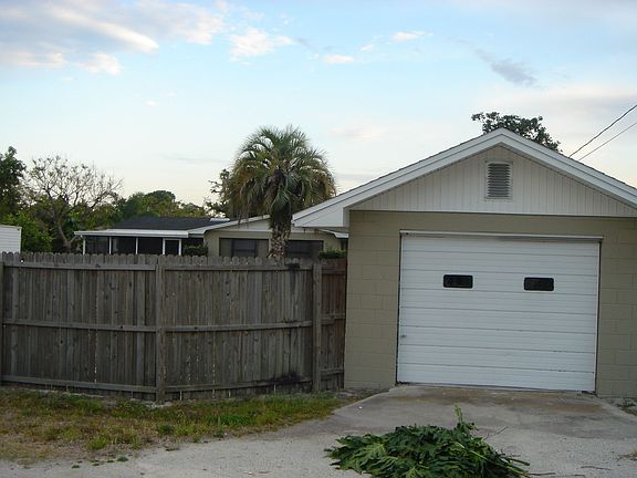 Enter garage through alley