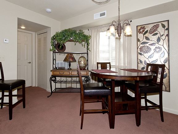 Dining Room with Window
(Furnishings Not Included)
Mini Blinds and Draperies Included