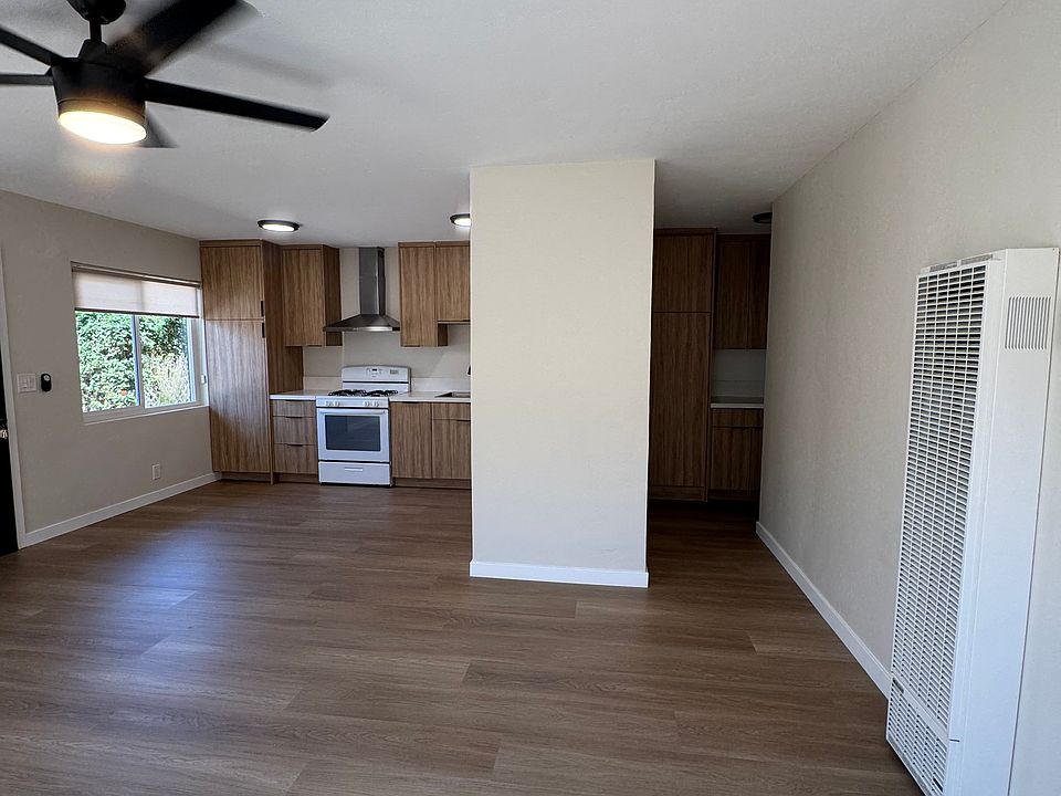 Living room facing the kitchen