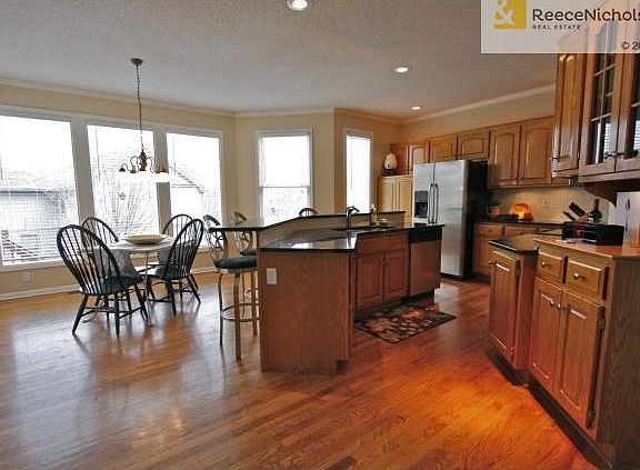 Natural light pours in through the beautiful windows. Lots of co