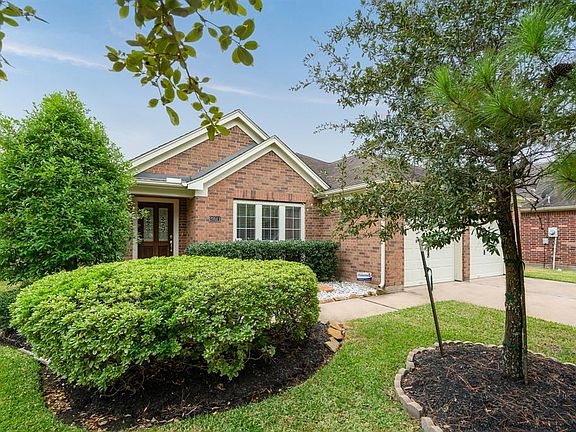 Mature trees and lush landscaping offers great curb appeal!