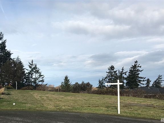 Viewing along west property line of Lot 10. Phone & PUD meter are approximately on the line.