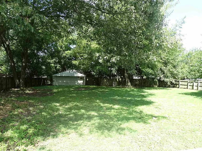 Adjacent lot with extra yard space.