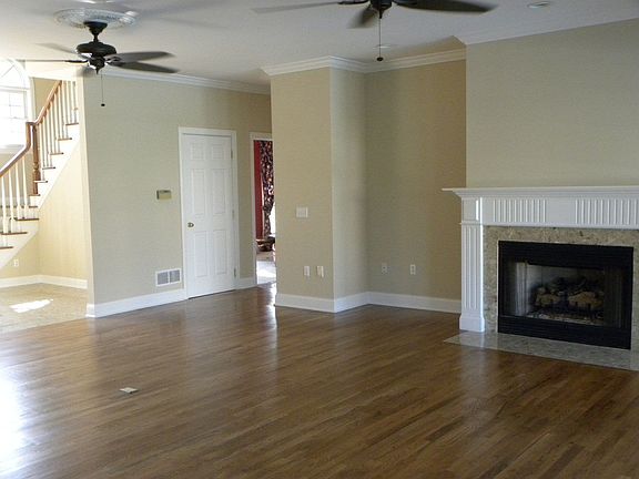 Another view of family room with fireplace