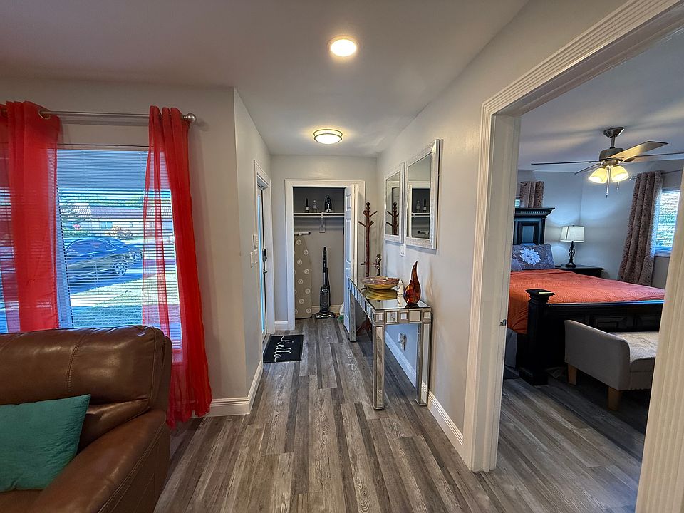 Entry area, with mirrors, smart locks, storage closet