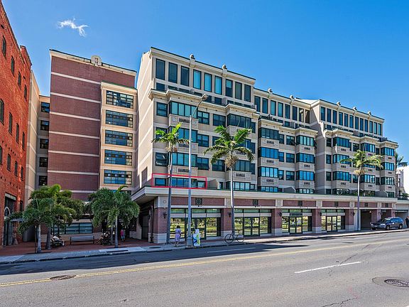 exterior building photo. Unit is highlighted in red.