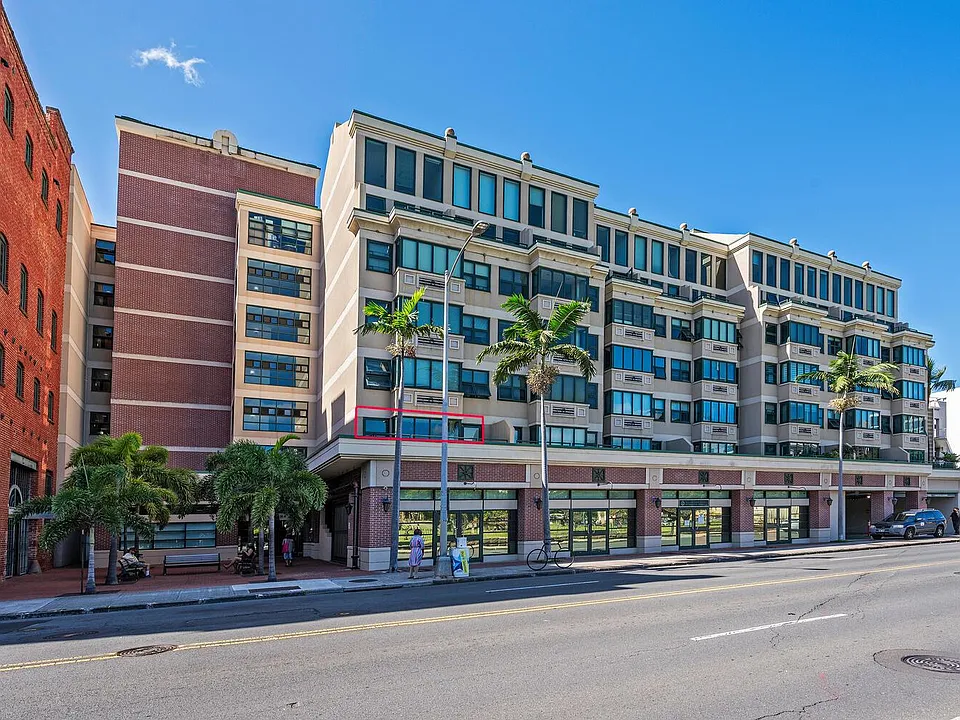 exterior building photo. Unit is highlighted in red.